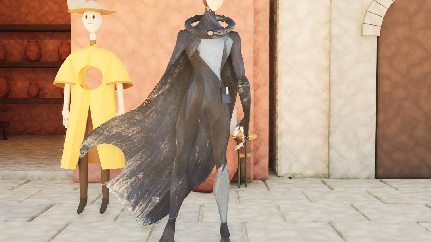 Kai in the shop doorway under standard lighting; the cape looks like grey cloth.